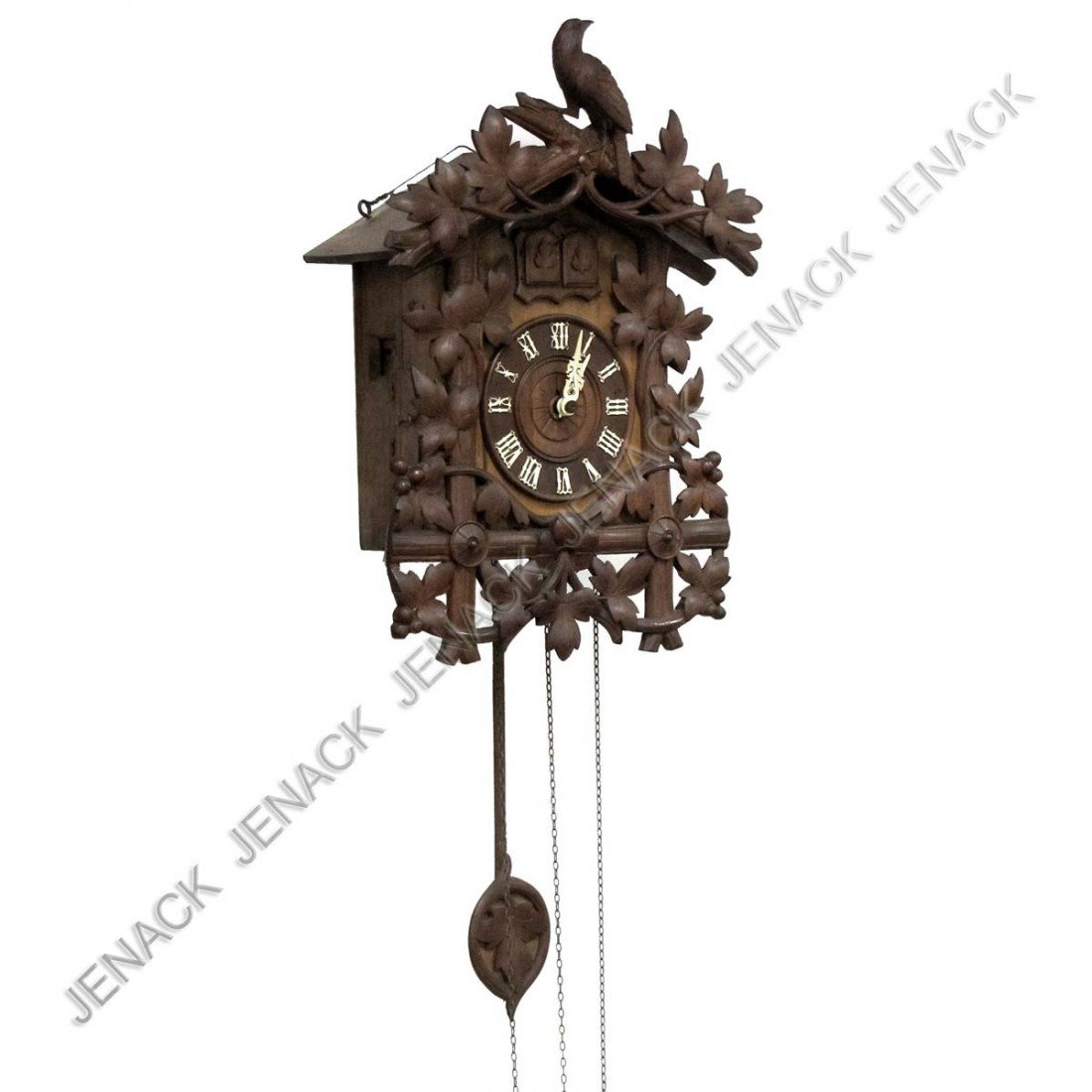 BLACK FOREST CARVED WALNUT DOUBLE CUCKOO CLOCK: BLACK FOREST CARVED WALNUT DOUBLE CUCKOO CLOCK, 19/20TH CENTURY. HEIGHT 21"