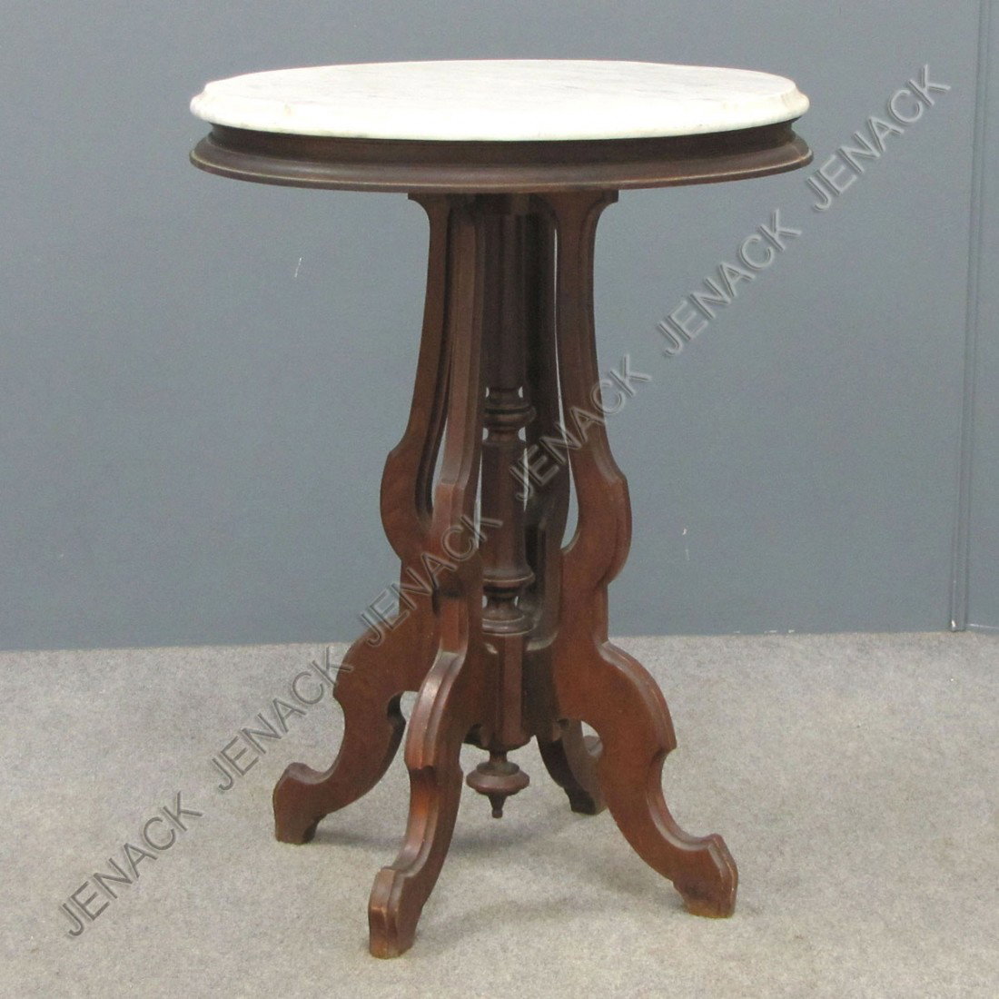 VICTORIAN CARVED WALNUT MARBLE TOP STAND: VICTORIAN CARVED WALNUT MARBLE TOP STAND. HEIGHT 29"; TOP 12 X 22"