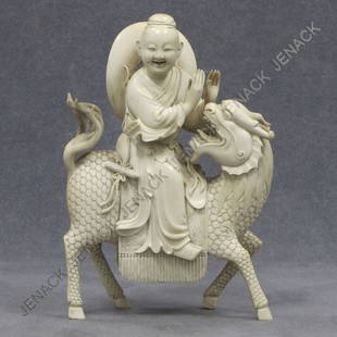 CHINESE CARVED IVORY FIGURE UPON A MYTHICAL BEAST: CHINESE CARVED IVORY FIGURE UPON A MYTHICAL BEAST, REPUBLIC. HEIGHT 8 1/4" **CANNOT EXPORT IVORY**