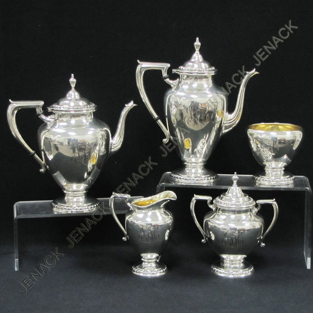 SET WALLACE STERLING "HALIFAX" PATTERN SERVICE: SET (5) WALLACE STERLING "HALIFAX" PATTERN COFFEE/TEA SERVICE, MONOGRAMMED, TWT 73.69 OZT INCLUDING COFFEE/TEA POTS, HEIGHT 10" & 11"; CREAMER/SUGAR, HEIGHT 6" & 7 1/2"; WASTE BOWL, HEIGHT 4"