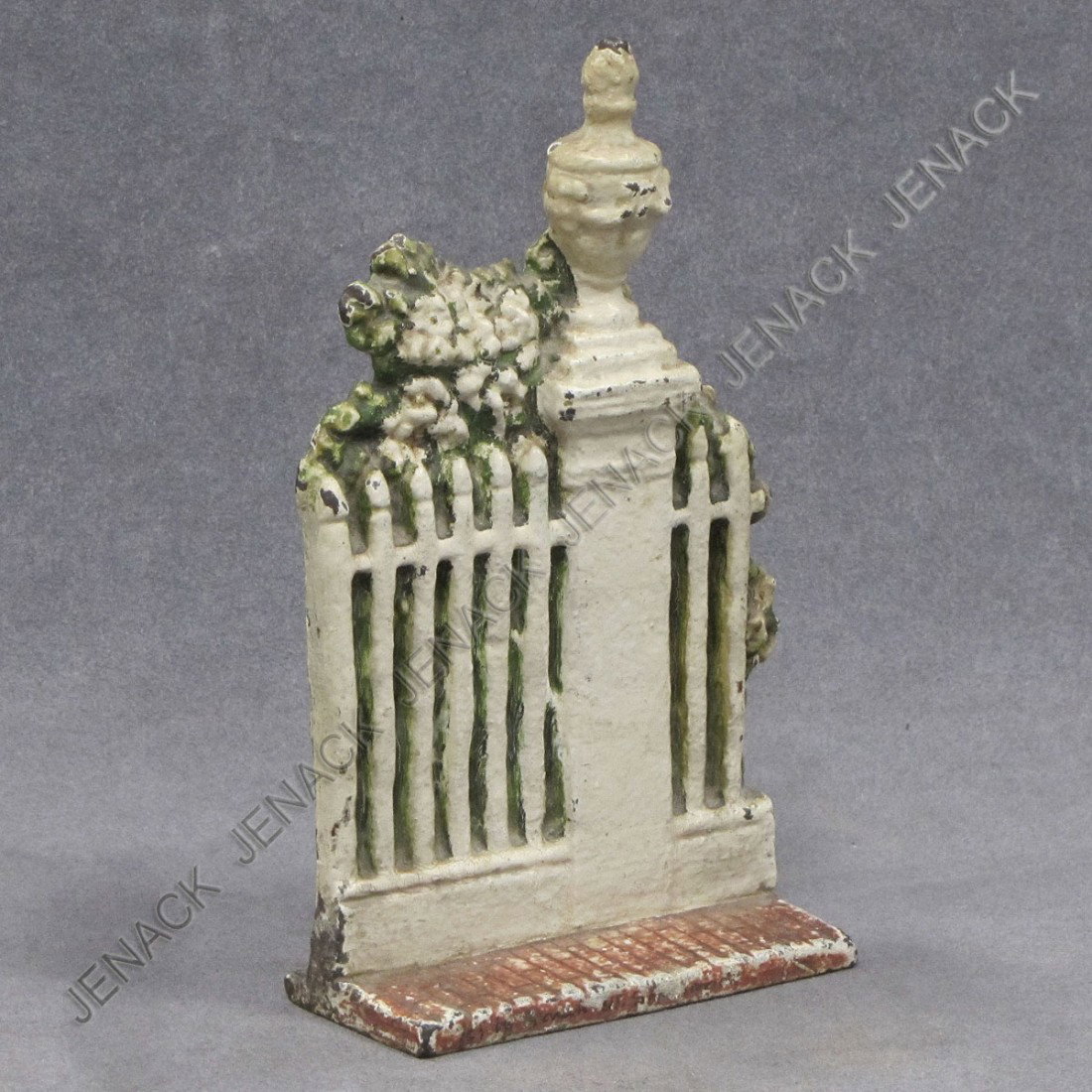 VINTAGE CAST IRON PAINTED FENCE DOORSTOP: VINTAGE CAST IRON PAINTED FENCE DOORSTOP. HEIGHT 8"; WIDTH 5"