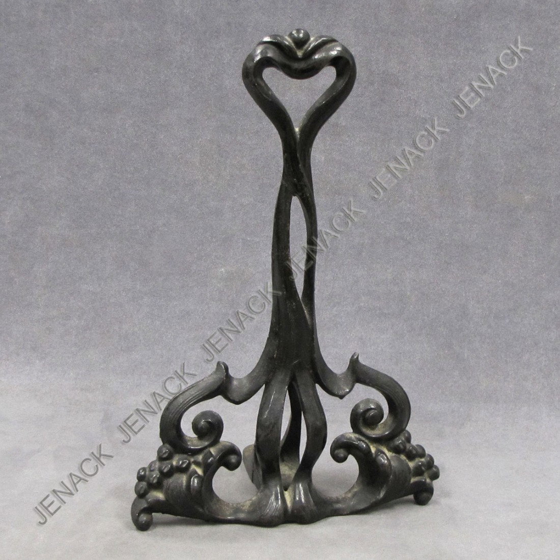 VINTAGE ART NOUVEAU CAST IRON DOOR PORTER: VINTAGE ART NOUVEAU CAST IRON DOOR PORTER. HEIGHT 13 1/2"