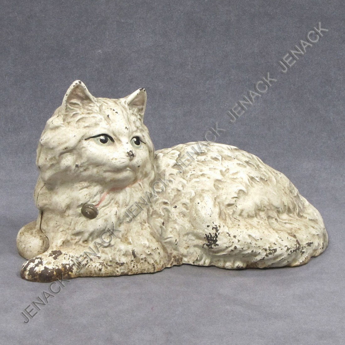 HUBLEY CAST IRON PAINTED LAYING CAT DOORSTOP: VINTAGE HUBLEY CAST IRON PAINTED LAYING CAT DOORSTOP, #335 SIGNED. LENGTH 10"