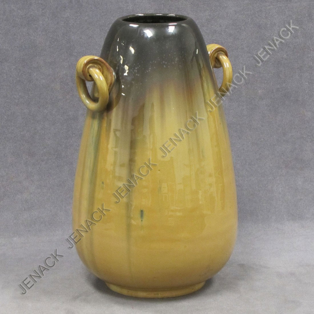 FINE FULPER GLAZED ART POTTERY RING HANDLED VASE: FINE FULPER GLAZED ART POTTERY RING HANDLED VASE, SIGNED. HEIGHT 13"