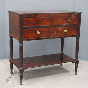 NEW YORK SHERATON MAHOGANY SERVER: NEW YORK SHERATON MAHOGANY SERVER WITH COOKIE CORNERS AND REEDED LEGS, 19TH CENTURY. HEIGHT 36"; WIDTH 36"