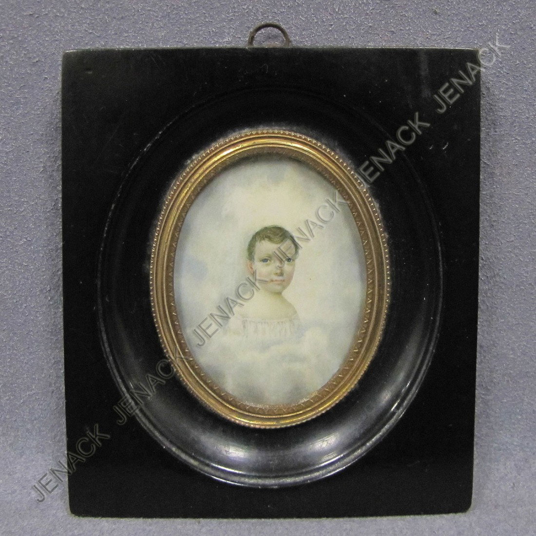 ENGLISH SCHOOL (19TH CENTURY) PORTRAIT MINIATURE: ENGLISH SCHOOL (19TH CENTURY) PORTRAIT MINIATURE WATERCOLOR ON IVORY, YOUNG BOY SET AGAINST CLOUDS. FRAMED AND GLAZED 4 1/8 X 3 3/4" **CANNOT EXPORT IVORY**