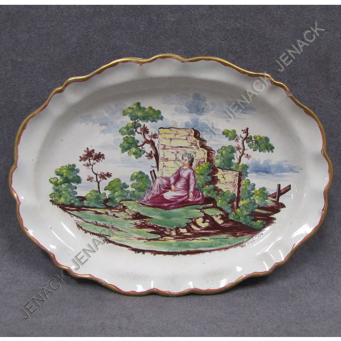 4 ASH BARRELS FACTORY, FAIENCE DISH: 4 ASH BARRELS FACTORY, PETIT FEU OVAL DECORATED FAIENCE DISH, C.1750. 5 1/4 X 7 1/4" (HAIRLINE)