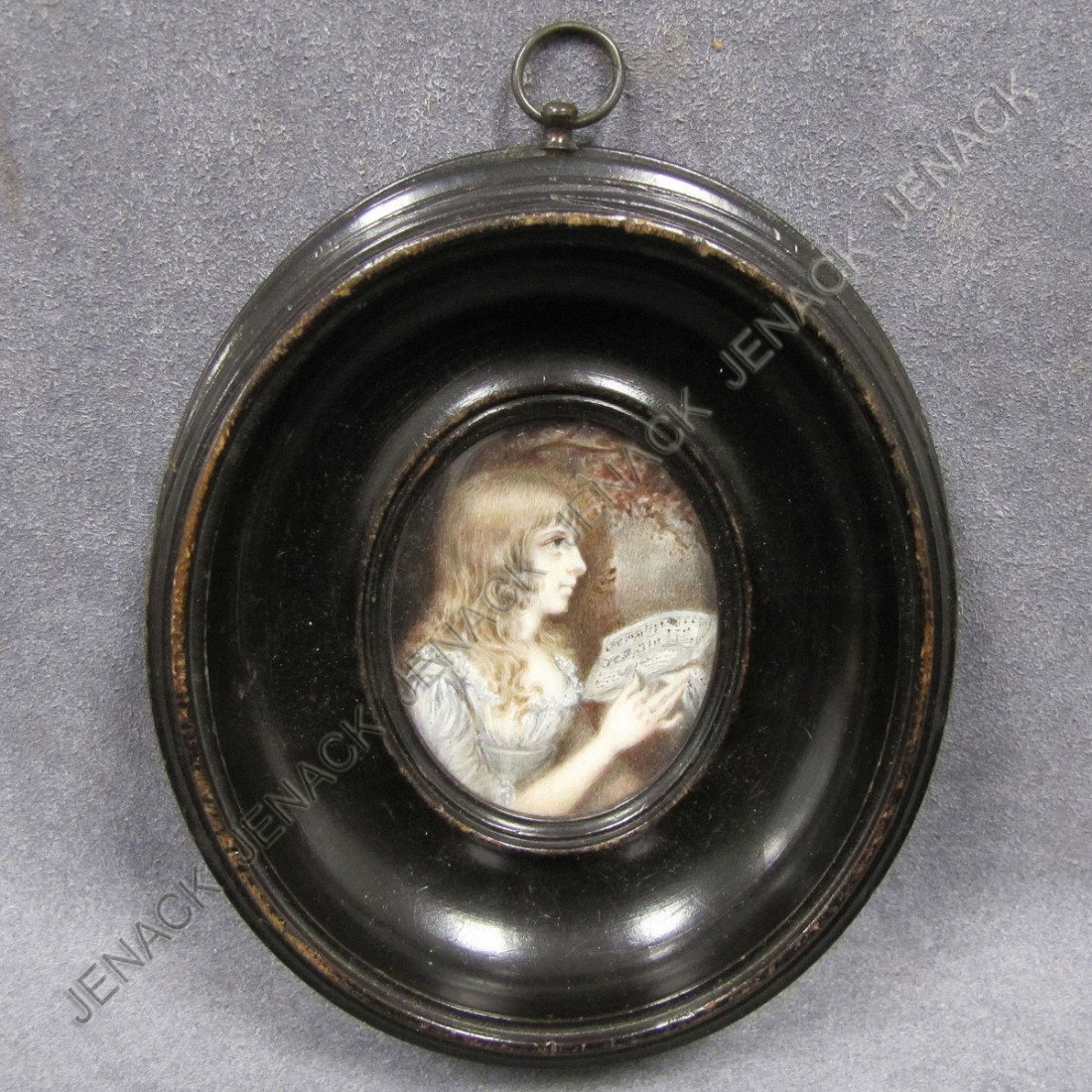 FRENCH SCHOOL (19TH CENTURY) PORTRAIT MINIATURE: FRENCH SCHOOL (19TH CENTURY) PORTRAIT MINIATURE WATERCOLOR ON IVORY, A GIRL HOLDING SHEET MUSIC. FRAMED & GLAZED, 5 1/2 X 4 3/4" **CANNOT EXPORT IVORY**