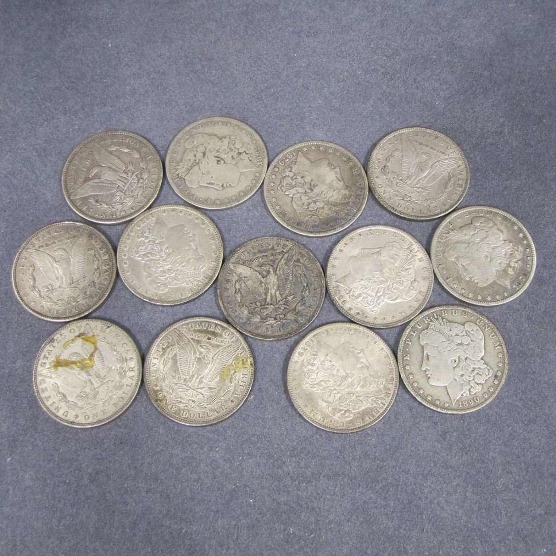 LOT (13) ASSORTED U.S. MORGAN SILVER DOLLAR COINS: LOT (13) ASSORTED U.S. MORGAN SILVER DOLLAR COINS, 1879-1900
