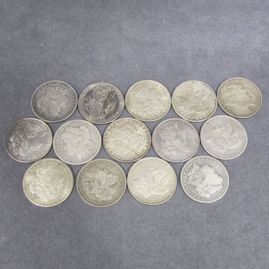 LOT (14) ASSORTED MORGAN SILVER DOLLAR COINS: LOT (14) ASSORTED MORGAN SILVER DOLLAR COINS INCLUDING 1886S