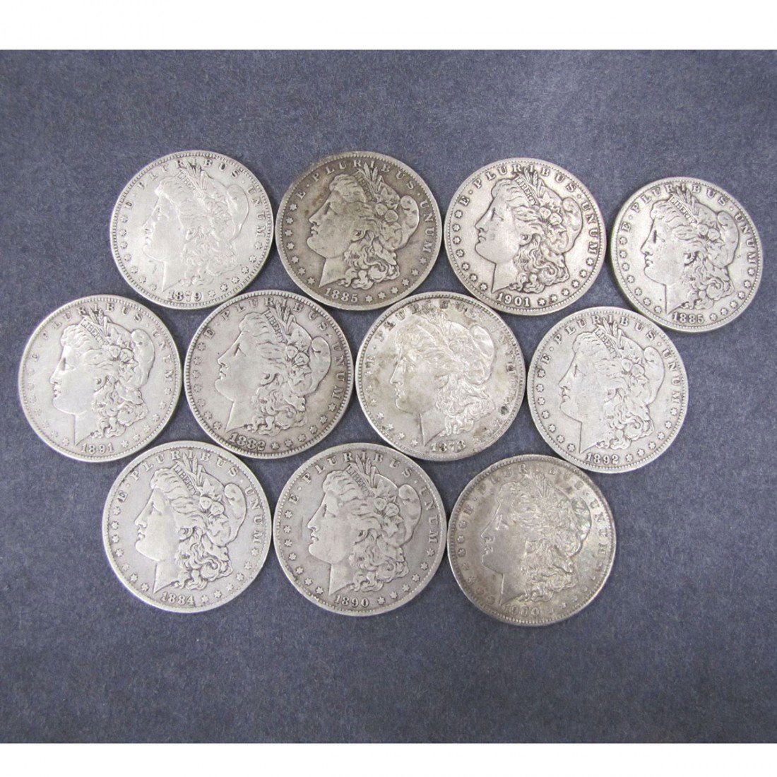 LOT (11) ASSORTED U.S. MORGAN SILVER DOLLAR COINS: LOT (11) ASSORTED U.S. MORGAN SILVER DOLLAR COINS