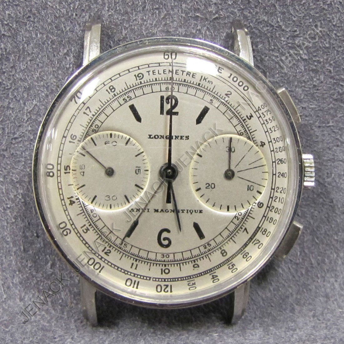 VINTAGE LONGINES STAINLESS STEEL CHRONOGRAPH: VINTAGE LONGINES STAINLESS STEEL CHRONOGRAPH WATCH HEAD WITH MULTIPLE REGISTERS. 35MM PROVENANCE: SOTHEBY'S NYC, LOT #287