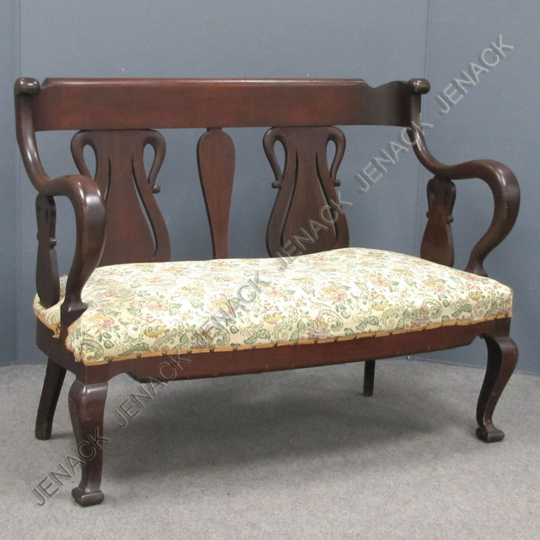 EMPIRE REVIVAL CARVED MAHOGANY SETTEE: EMPIRE REVIVAL CARVED MAHOGANY SETTEE. LENGTH 46"