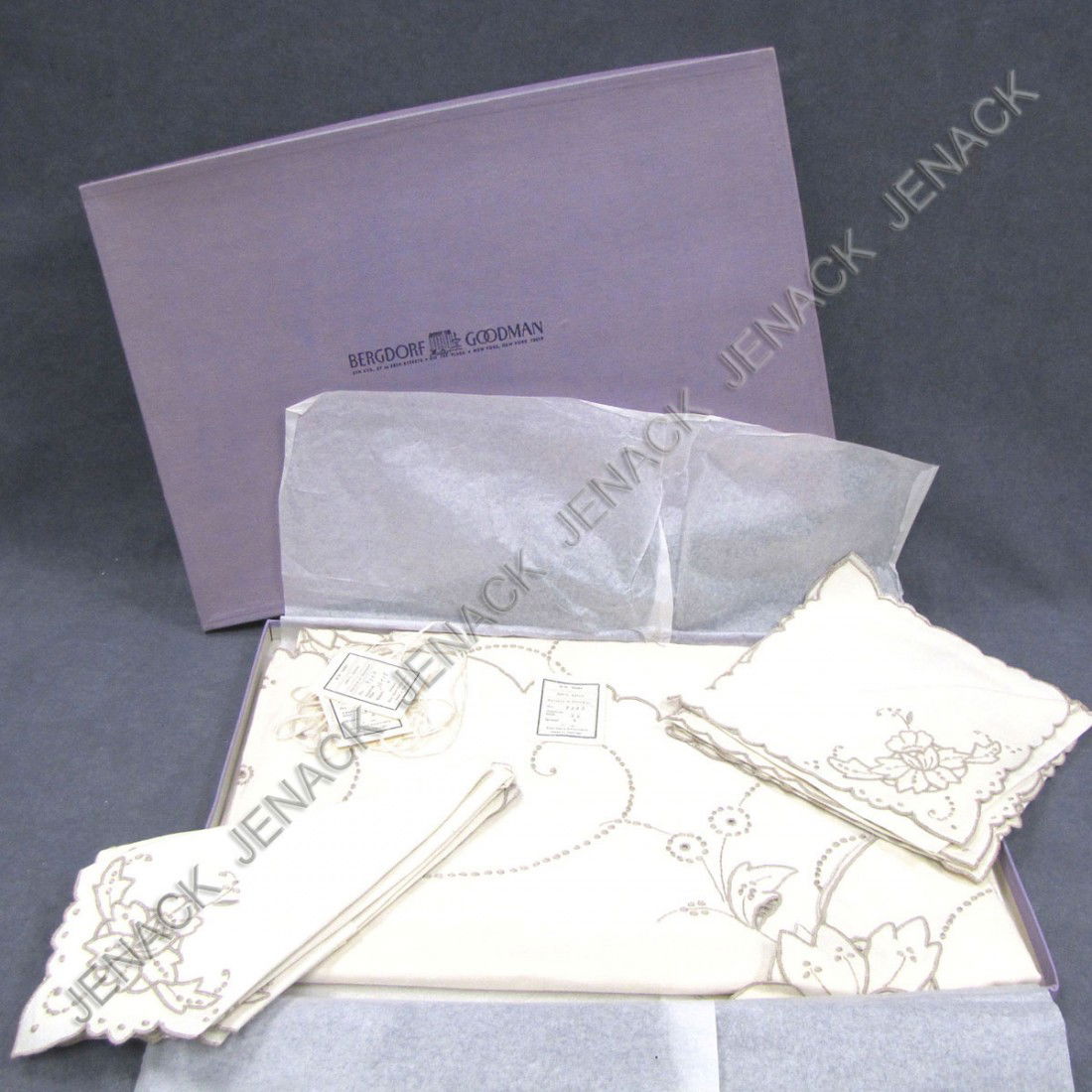 SET PORTUGUESE ECRU LINEN TABLECLOTH: SET PORTUGUESE ECRU EMBROIDERED OPEN-WORK LINEN TABLECLOTH WITH (8) NAPKINS WITH ORIGINAL BERGDORF GOODMAN BOX