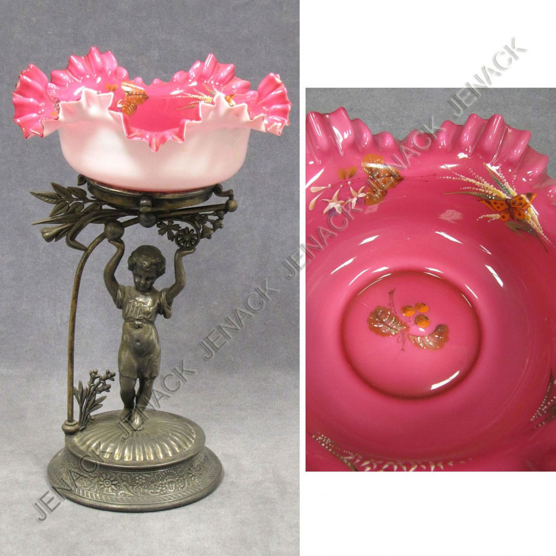 VICTORIAN MERIDEN FIGURAL BASE CENTERPIECE: VICTORIAN MERIDEN SILVER PLATE FIGURAL BASE CENTER PIECE WITH CRANBERRY CASE GLASS FLUTED AND ENAMEL DECORATED BOWL, SIGNED THOMAS WEBB. HEIGHT 14"; DIAMETER 9 1/4"