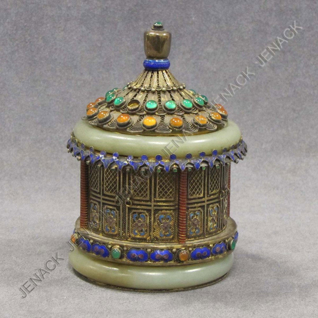 CONTINENTAL GILT AND ENAMELED SILVER BOX: CONTINENTAL GILT AND ENAMELED SILVER AND GEM AND HARD STONE MOUNTED BOX. HEIGHT 5"; DIAMETER 3 3/8"