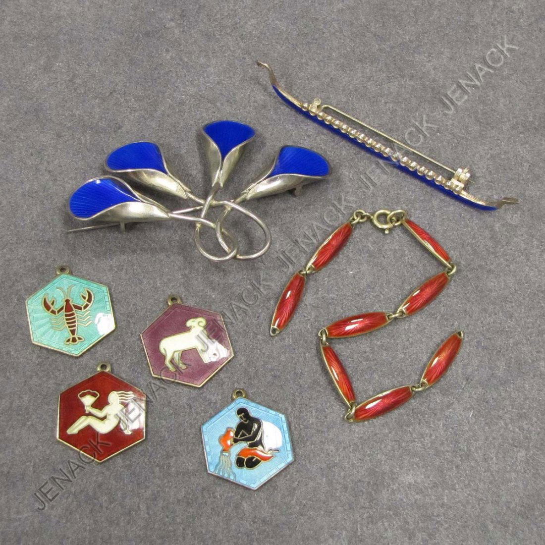 LOT STERLING JEWELRY INCLUDING (2) ENAMEL PINS: LOT STERLING JEWELRY INCLUDING (2) ENAMEL PINS, BRACELET (MISSING 1/RING), (4) CHARMS INCLUDING DAVID ANDERSEN & J. TOSTRUP. GROSS WEIGHT 1.10 OZT