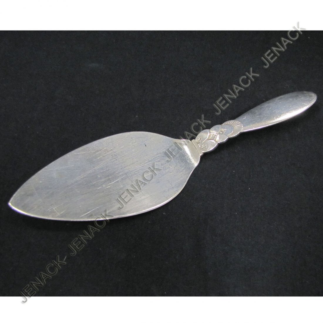 GEORG JENSEN STERLING "CACTUS" PIE SERVER: GEORG JENSEN STERLING "CACTUS" PIE SERVER. LENGTH 8 5/8"; 3.38 OZT