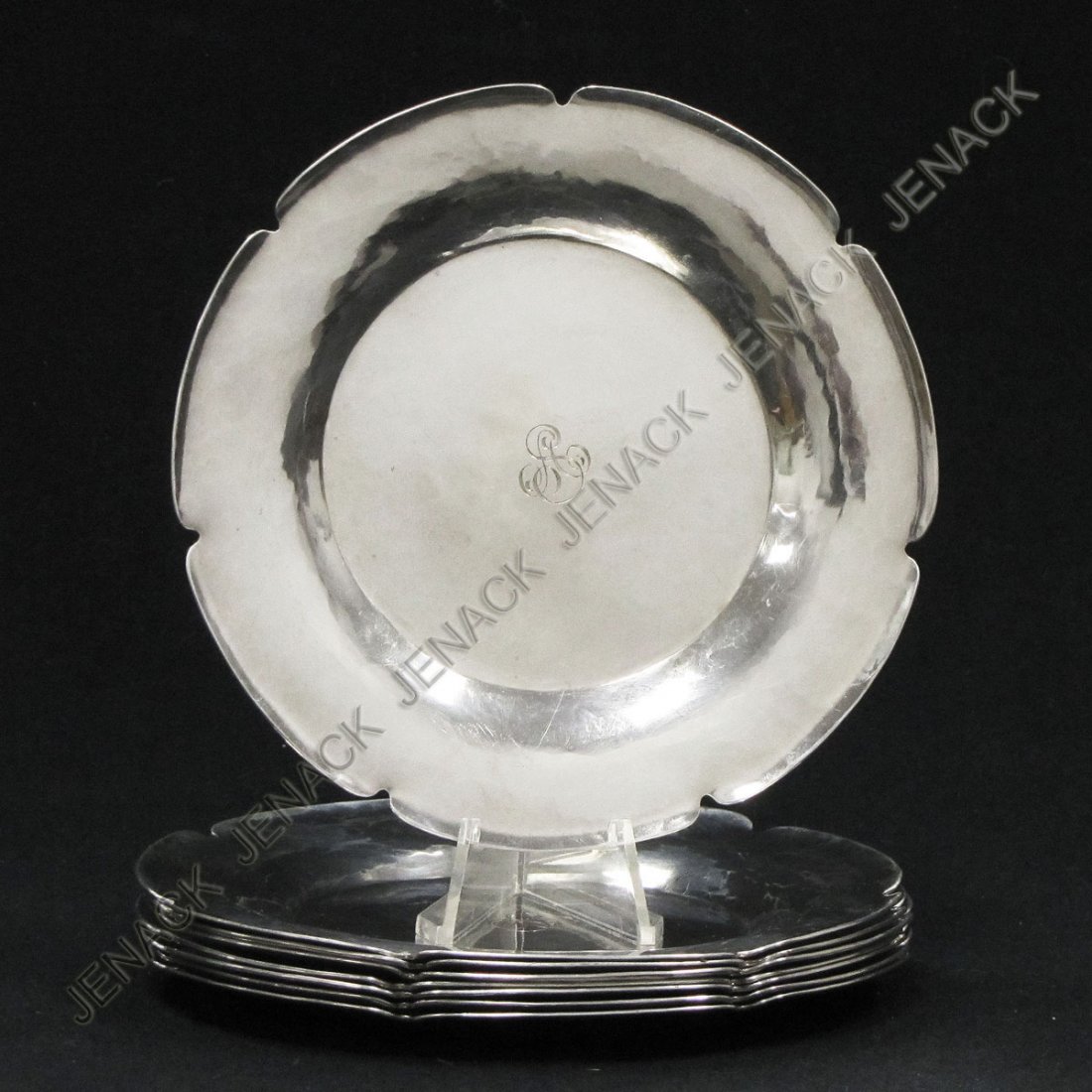 SET (8) JOEL F. MEWES HANDMADE STERLING PLATES: SET (8) JOEL F. MEWES HANDMADE STERLING PLATES, MONOGRAMMED. DIAMETER 5 1/2"; TWT 44.21 OZT