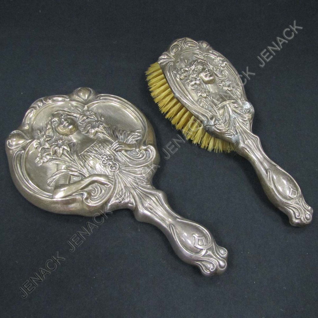 LOT (2) ART NOUVEAU STERLING HAND MIRROR, BRUSH: LOT (2) ART NOUVEAU STERLING HAND MIRROR AND HAIR BRUSH. MIRROR/LENGTH 9 1/2" (BRUSH/AS IS)