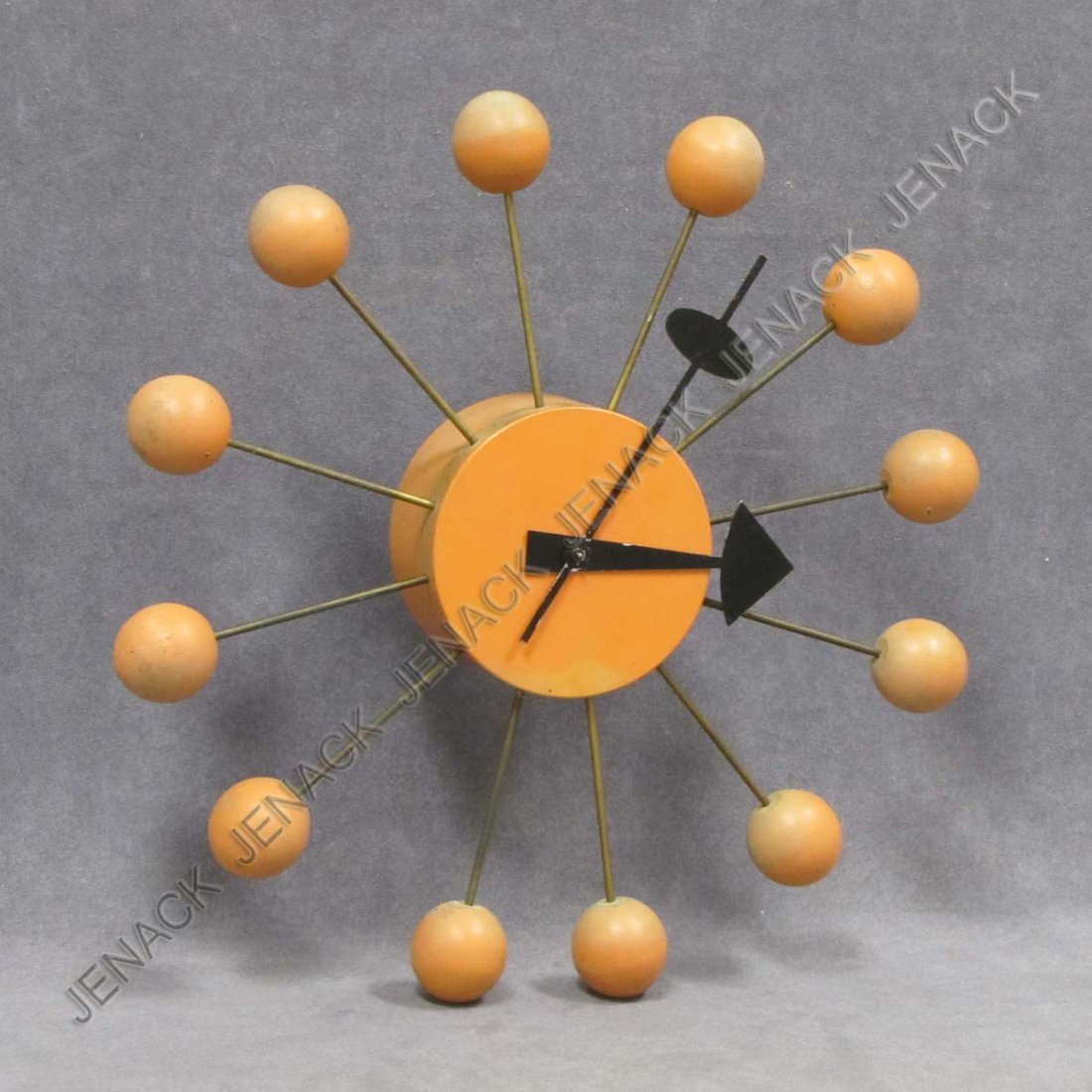 GEORGE NELSON DESIGN HOWARD MILLER WALL CLOCK: GEORGE NELSON DESIGN HOWARD MILLER PAINTED WALL CLOCK, ELECTRIC. DIAMETER 13 1/2"