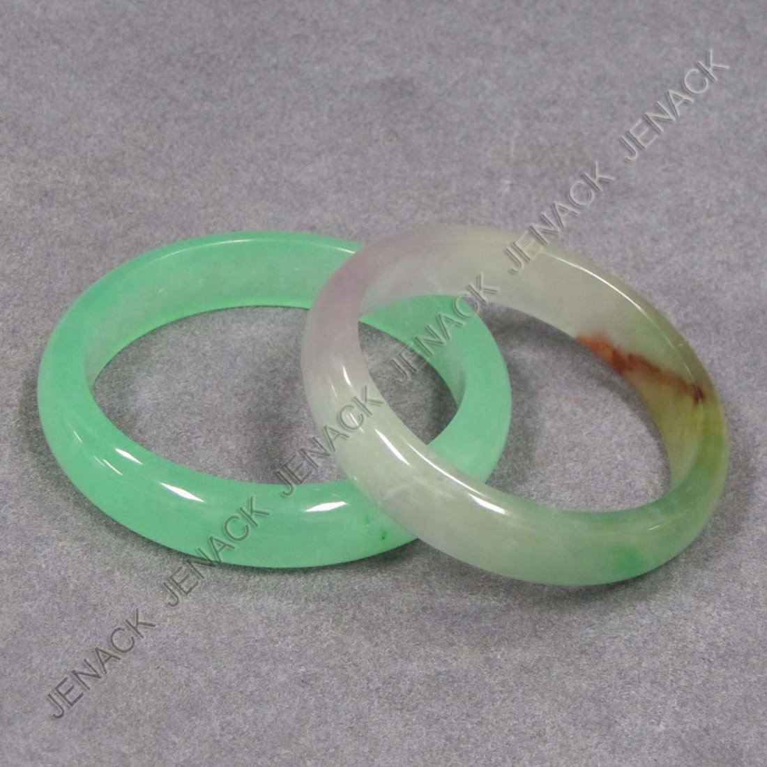 LOT (2) CHINESE JADE BANGLES: LOT (2) CHINESE JADE BANGLES. DIAMETER 3"