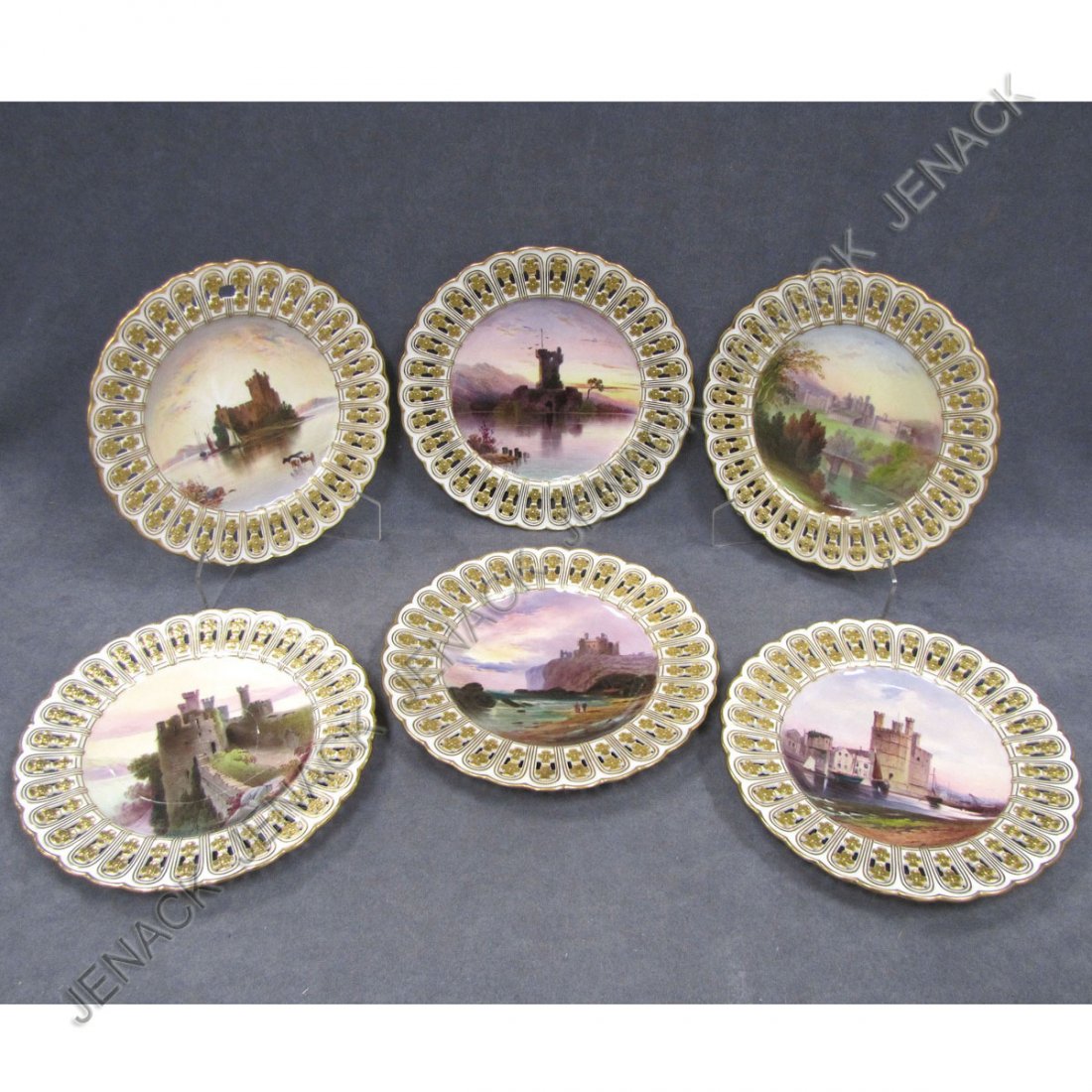 SET (6) MINTON'S DECORATED PORCELAIN RETICULATED: SET (6) MINTON'S DECORATED PORCELAIN RETICULATED "CASTLE" CABINET PLATES INCLUDING TANTALLON CASTLE, CARNARVON CASTLE, ETC, ARTIST SIGNED J.E. DEAN, 19TH CENTURY. DIAMETER 9 1/4" (REPAIR/RESTORATION/L