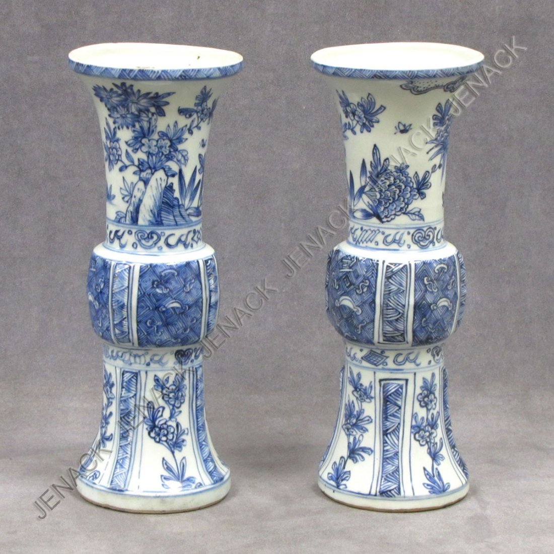PAIR CHINESE BLUE/WHITE DECORATED PORCELAIN BEAKER: PAIR CHINESE BLUE/WHITE DECORATED PORCELAIN BEAKER VASES. HEIGHT 12"