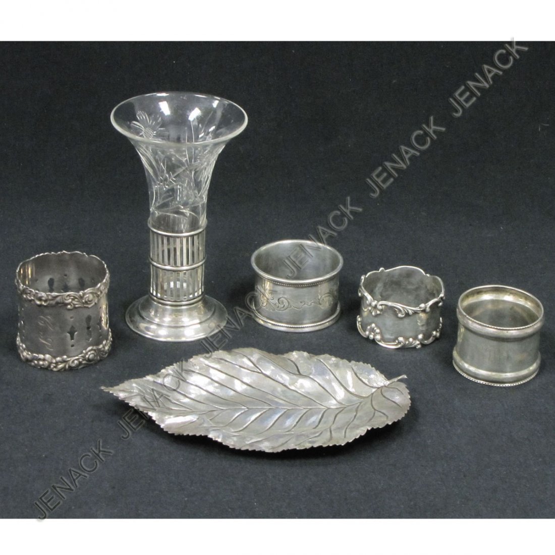 LOT (6) ASSORTED STERLING: LOT (6) ASSORTED STERLING INCLUDING CASED CUT GLASS BUD VASE, (4) NAPKIN RINGS, AND PIN TRAY. TWT 4.56 OZT
