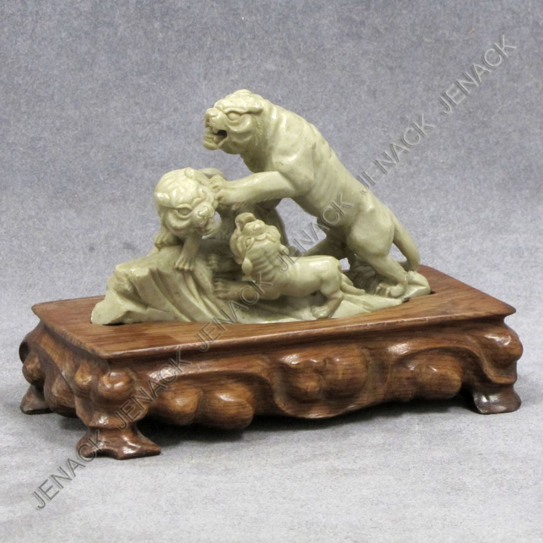 CHINESE CARVED SOAPSTONE GROUP OF TIGERS: CHINESE CARVED SOAPSTONE GROUP OF TIGERS WITH STAND. HEIGHT 4 1/2"; LENGTH 6"