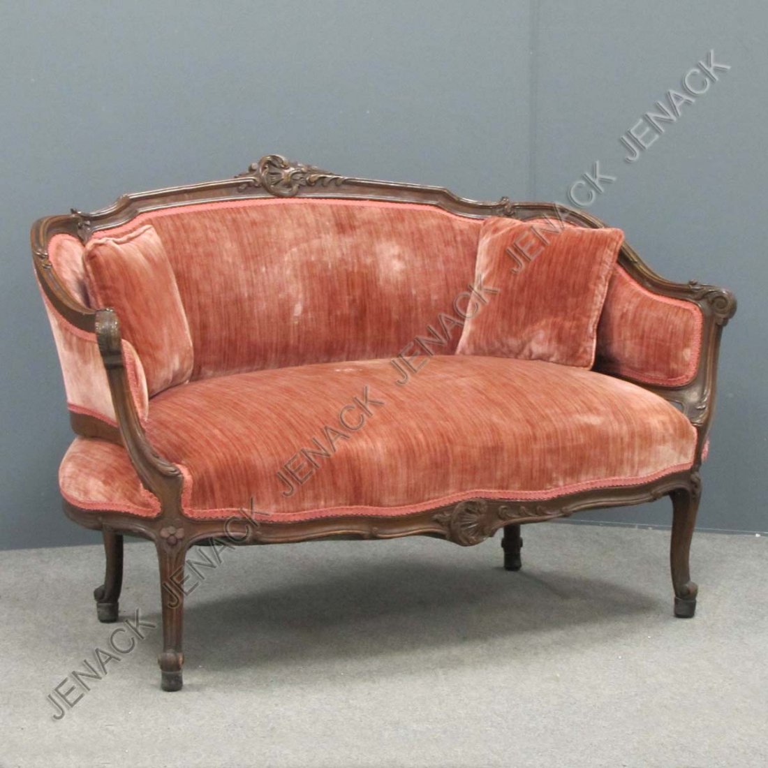 FRENCH STYLE CARVED WALNUT SETTEE: FRENCH STYLE CARVED WALNUT SETTEE. HEIGHT 32"; LENGTH 48"