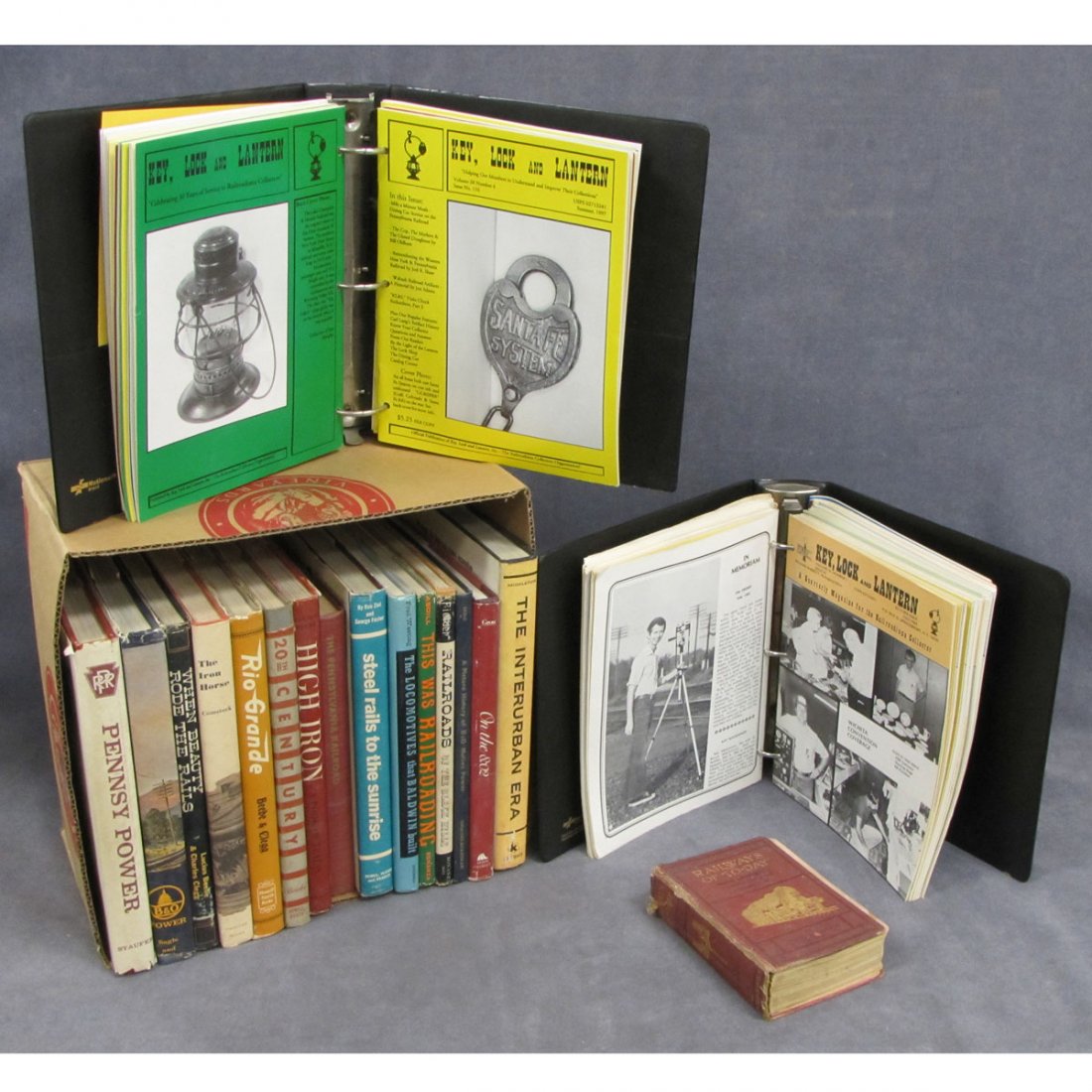 LOT (2) BOXES INCLUDING (16) ASSORTED RAILROAD: LOT (2) BOXES INCLUDING (16) ASSORTED RAILROAD BOOKS AND (2) BINDERS - KEY, LOCK AND LANTERN