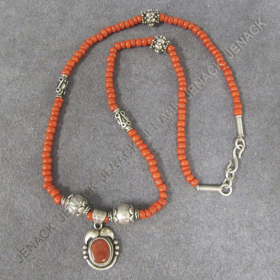 .925 SILVER CARNELIAN PENDANT WITH FAUX CORAL: .925 SILVER CARNELIAN PENDANT WITH FAUX CORAL AND SILVER BEADS. LENGHT 19 1/2"