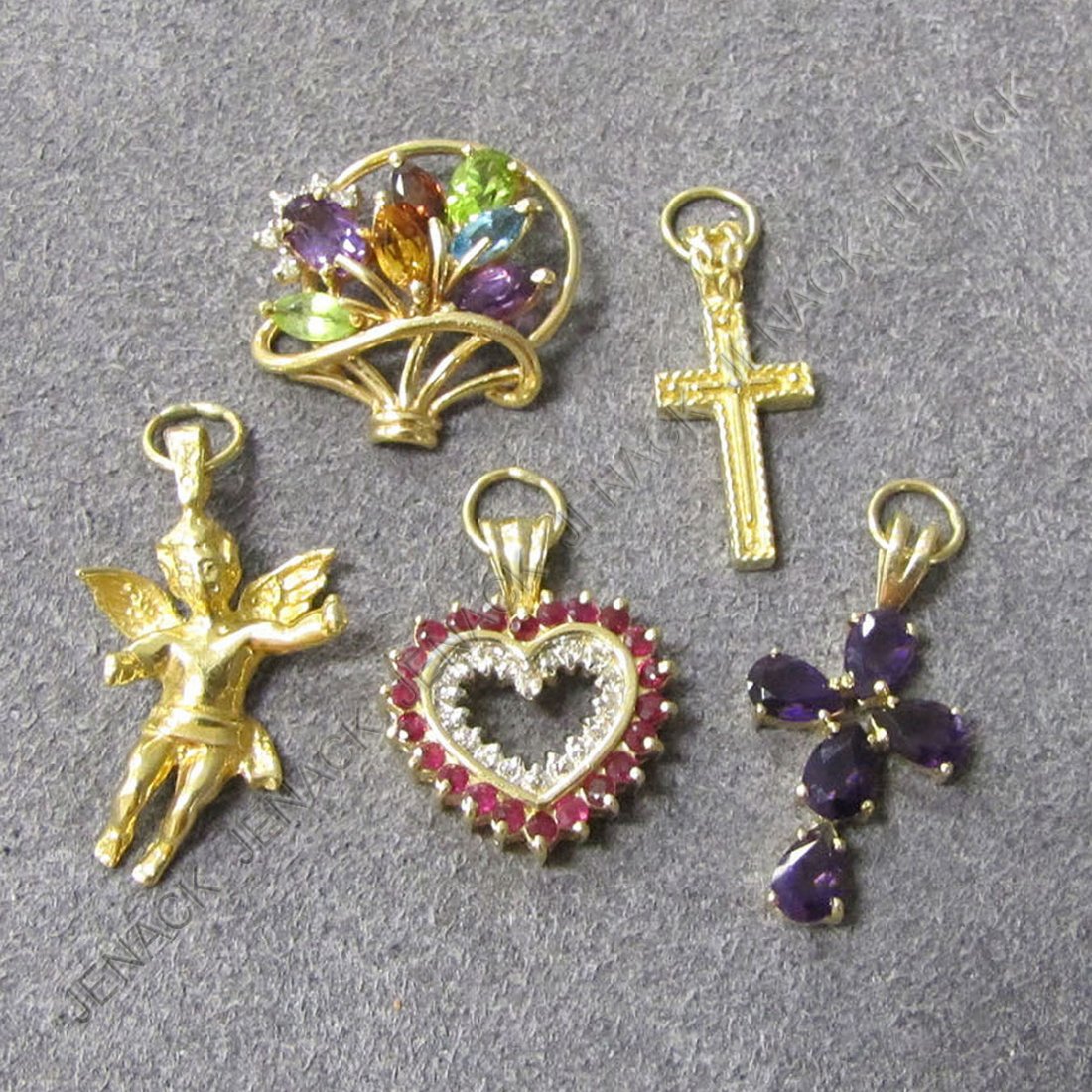 LOT (5) 14K YELLOW GOLD CHARMS INCLUDING AMETHYST,: LOT (5) 14K YELLOW GOLD CHARMS INCLUDING AMETHYST, CROSS, RUBY/DIAMOND HEART, SEMI-PRECIOUS STONE BASKET, ANGEL AND CROSS. GROSS WEIGHT 12.18 GRAMS