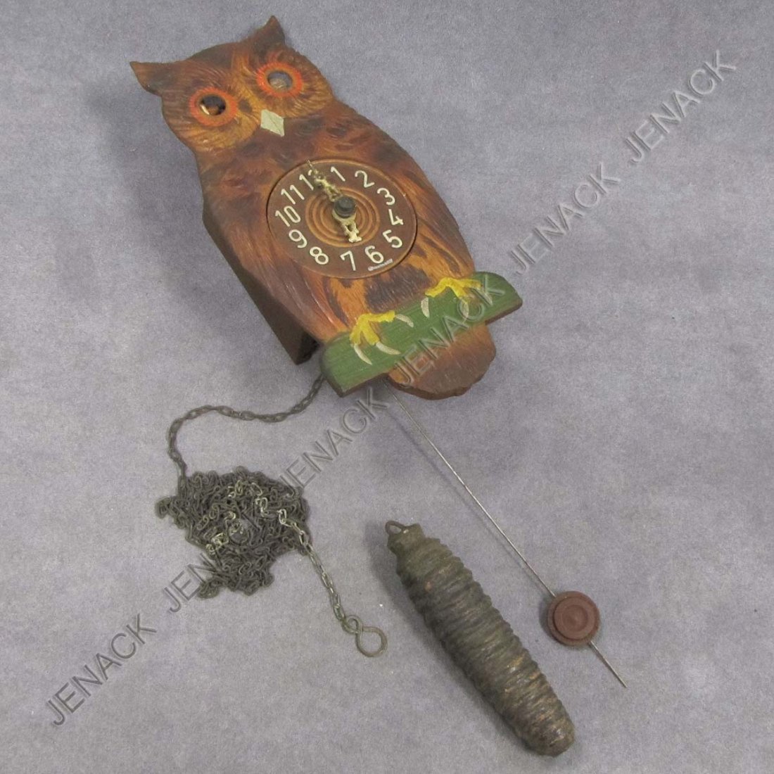 VINTAGE GERMAN PAINTED WOOD OWL WALL CLOCK: VINTAGE GERMAN CARVED AND PAINTED WOOD OWL WALL CLOCK WITH MOVING EYES. HEIGHT 8"