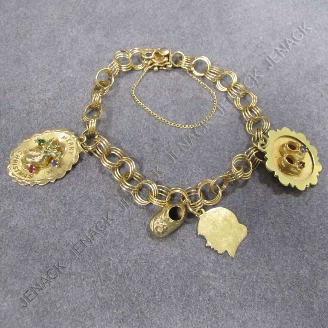 14K YELLOW GOLD CHARM BRACELET WITH (4) CHARMS: 14K YELLOW GOLD CHARM BRACELET WITH (4) CHARMS. LENGTH 7"; GROSS WEIGHT 15.0 GRAMS