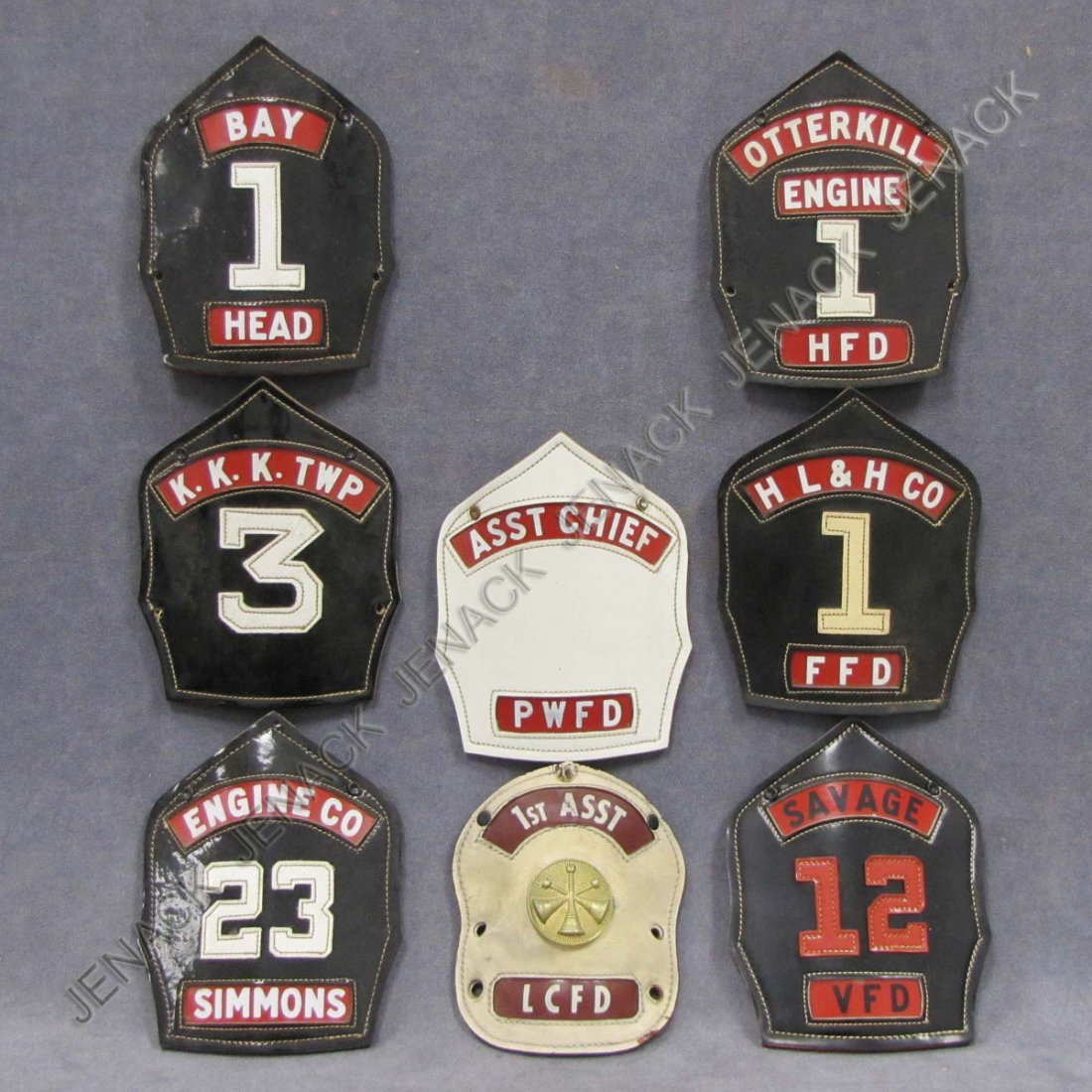 LOT (8) ASSORTED CARINS LEATHER FIRE HELMET SHIELD: LOT (8) ASSORTED CARINS LEATHER FIRE HELMET SHIELDS