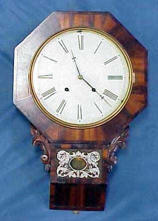 183: WELCH TIME & STRIKE MAHOGANY CLOCK: WELCH TIME & STRIKE EARLY MAHOGANY SCHOOLHOUSE WALL CLOCK. HEIGHT 25" CONDITION: ALL ORIGINAL AND IN SUPERIOR CONDITION. GREAT EXAMPLE. **PLEASE NOTE: DUE TO THE LARGE SIZE AND/OR FRAGILITY OF THIS PI