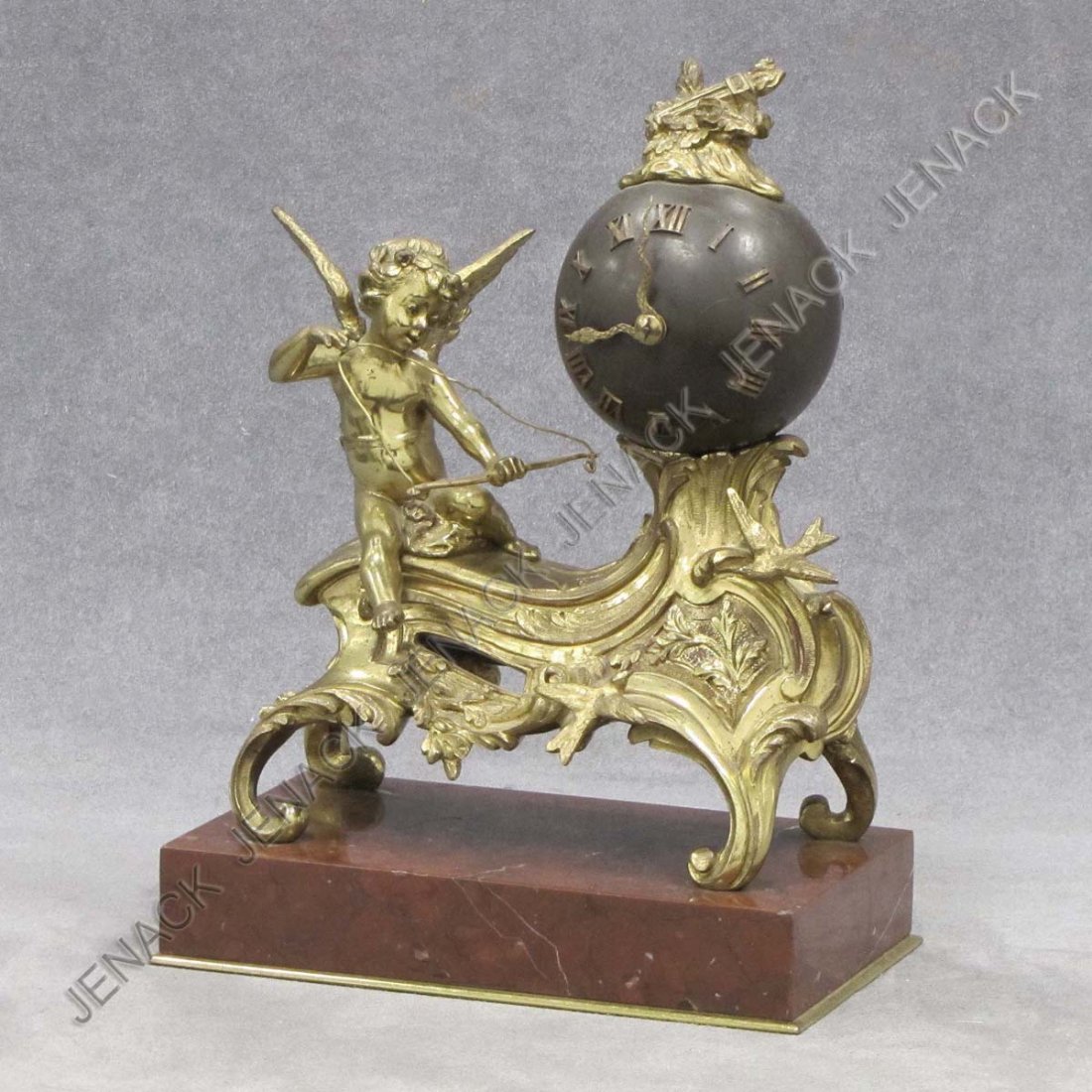 FRENCH LOUIS XV STYLE GILT BRONZE MANTLE CLOCK: FRENCH LOUIS XV STYLE GILT BRONZE FIGURAL MANTLE CLOCK WITH MARBLE BASE. HEIGHT 9 3/4"; WIDTH 7"