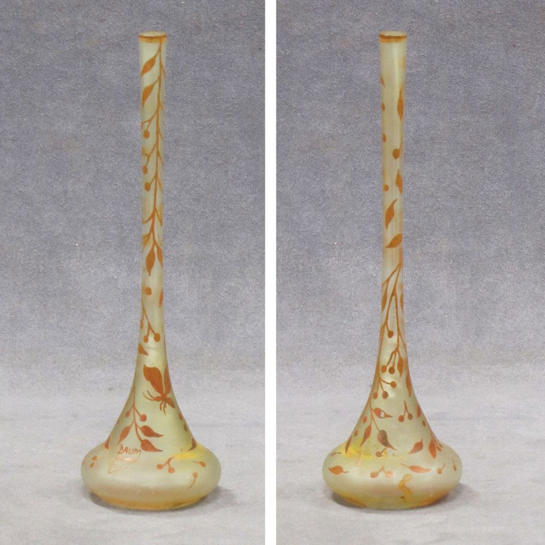 DAUM NANCY CARVED CAMEO GLASS STICK VASE, BRANCHES: DAUM NANCY CARVED CAMEO GLASS STICK VASE, BRANCHES AND BUTTERFLY, SIGNED. HEIGHT 9 3/4"