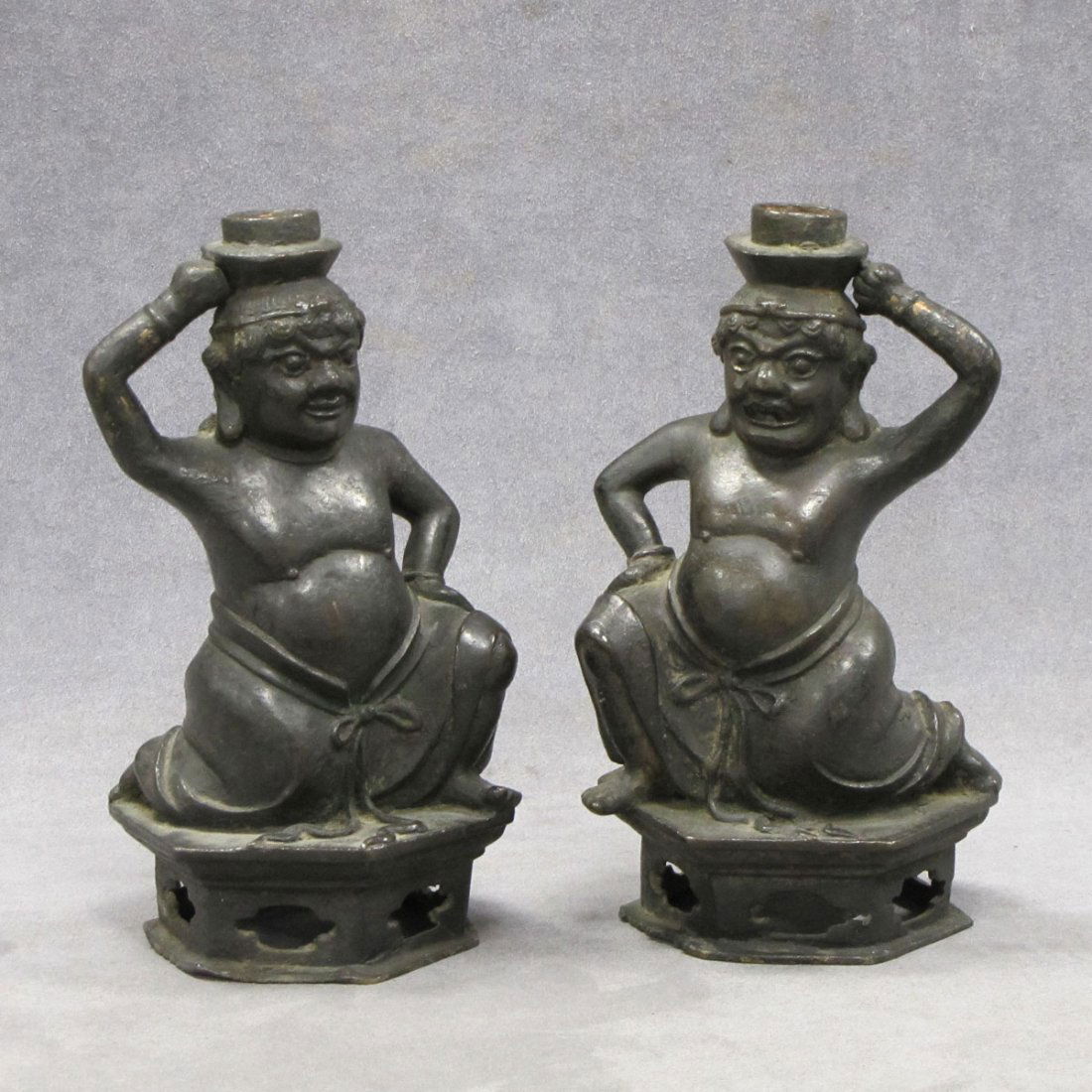 PAIR CHINESE FIGURAL BRONZE CANDLE HOLDERS