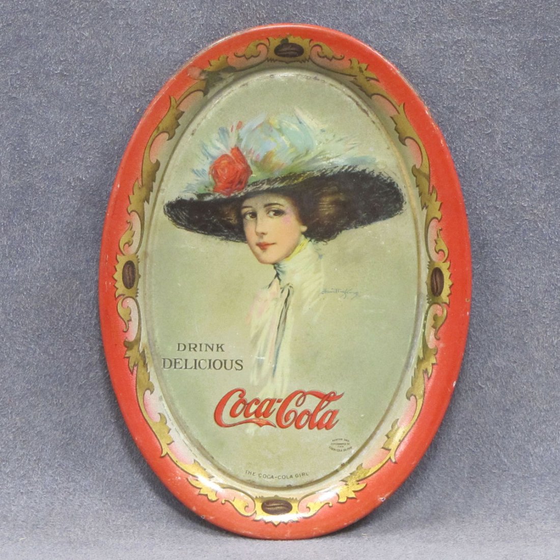 1910 COCA-COLA TIP TRAY, LITHO/METAL, SIGNED : 1910 COCA-COLA TIP TRAY, LITHO/METAL, SIGNED AMERICAN ART WORKS INC, COSHOCTON, OHIO. 6 X 4 1/4"