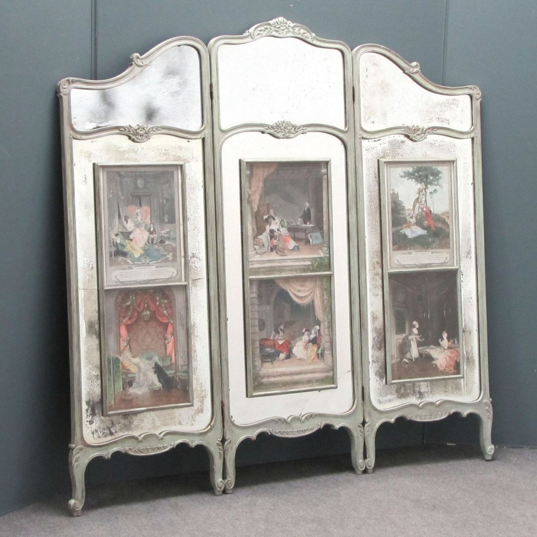 FRENCH STYLE MIRRORED DRESSING SCREEN: FRENCH STYLE CARVED AND PAINTED MIRRORED 3-PART DRESSING SCREEN. HEIGHT 55"; TOTAL/WIDTH 54" (MIRROR/IMPERFECTION)