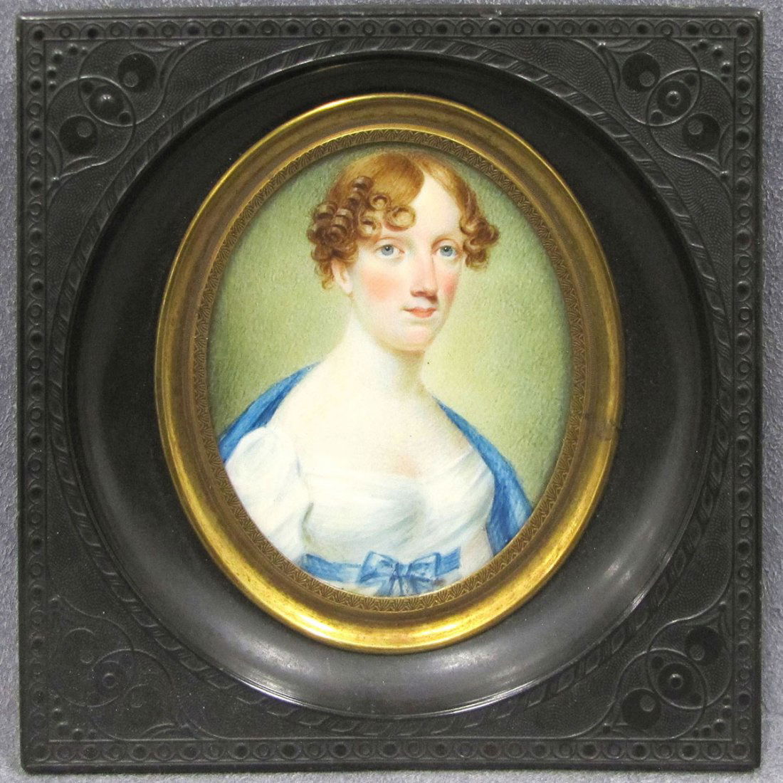 BRITISH SCHOOL (19TH CENTURY) PORTRAIT MINIATURE: BRITISH SCHOOL (19TH CENTURY) WATERCOLOR ON IVORY, PORTRAIT MINIATURE OF A WOMAN IN FINE GUTTA PERCHA FRAME. 2 1/2 X 2 1/8"; FRAMED 4 1/8 X 4 1/8" **CANNOT EXPORT** DEC #16-33