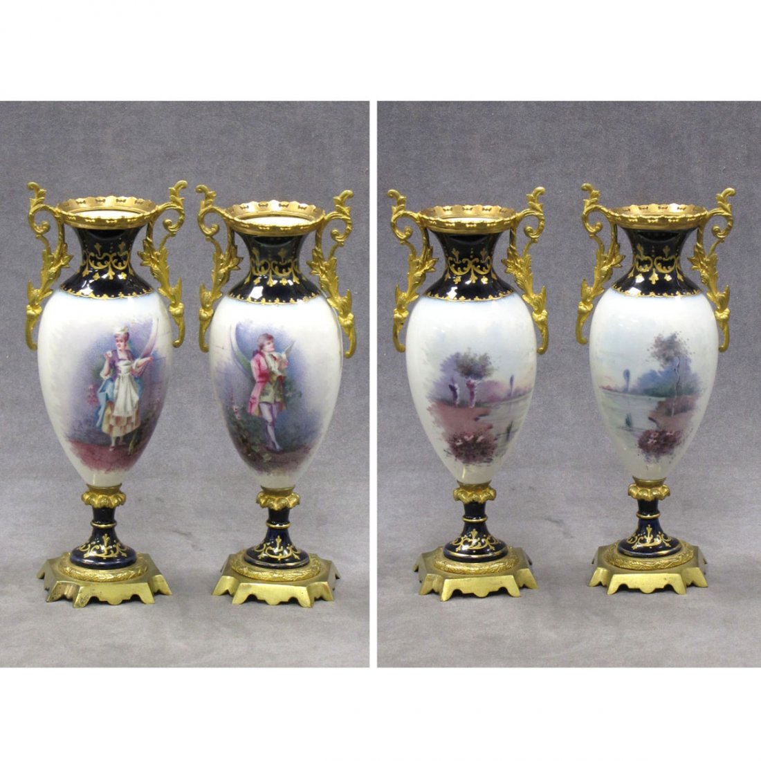 PAIR CONTINENTAL HAND PAINTED PORCELAIN URNS: PAIR CONTINENTAL HAND PAINTED PORCELAIN URNS, SIGNED PIJOT WITH ORMOLU MOUNTS. HEIGHT 11"