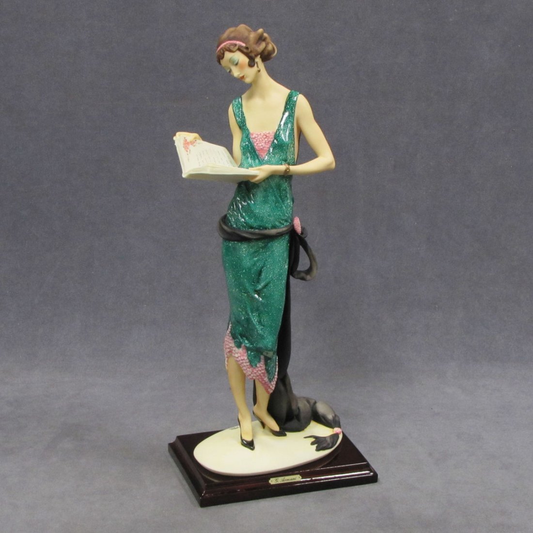 GIUSEPPE ARMANI SCULPTURE, "LADY WITH A BOOK" : GIUSEPPE ARMANI SCULPTURE, "LADY WITH A BOOK", SIGNED CAPO DI MONTE. HEIGHT 18" (NIB)