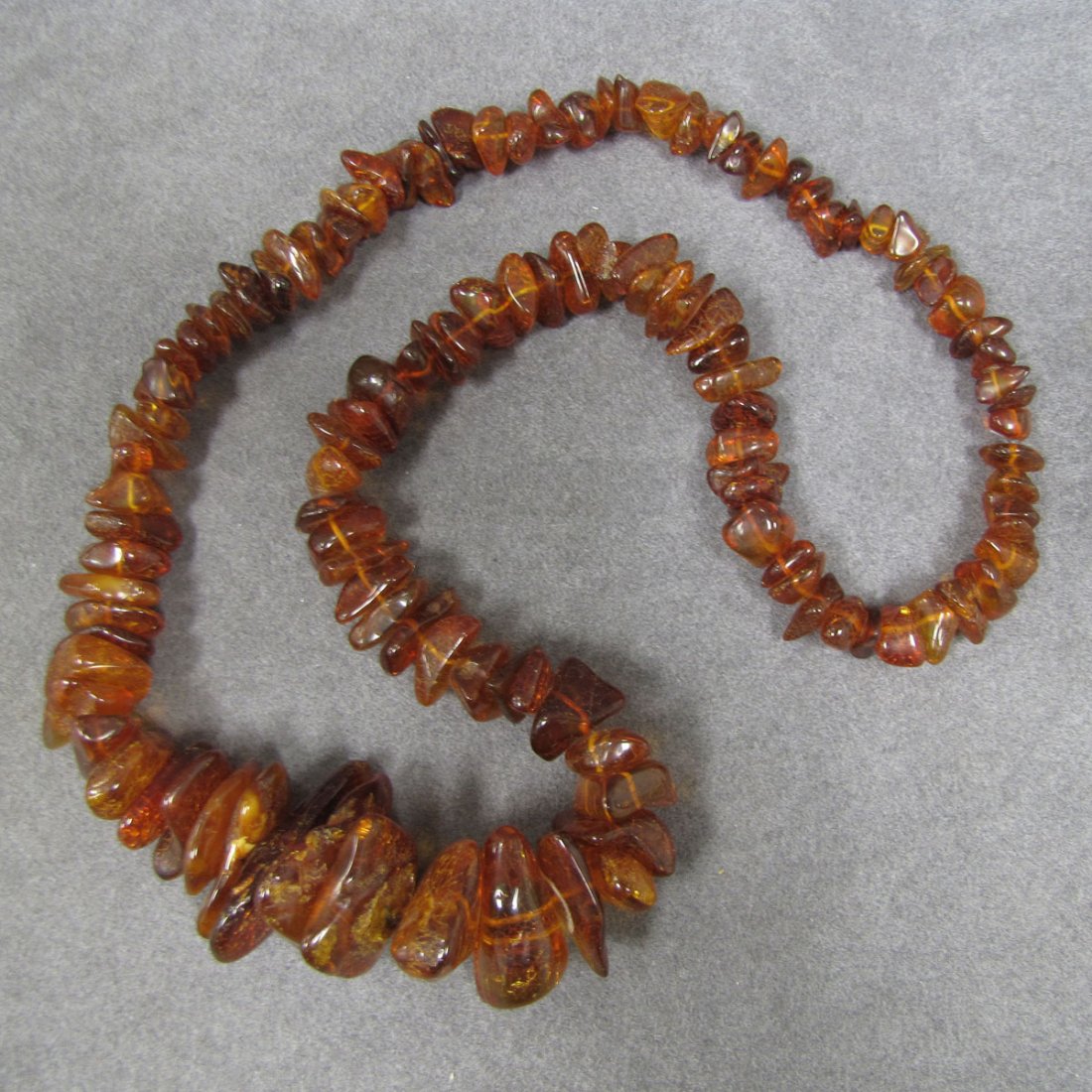 GRADUATED STRAND TUMBLED AMBER BEAD NECKLACE