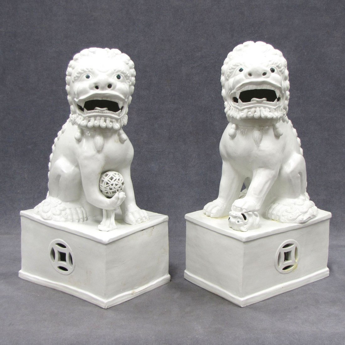 PAIR CHINESE BLANC DE CHINE PORCELAIN FOO DOGS