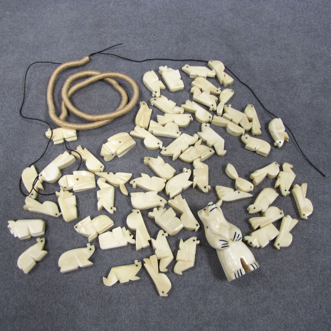 NORTHWEST COAST CARVED MARINE IVORY BEADS