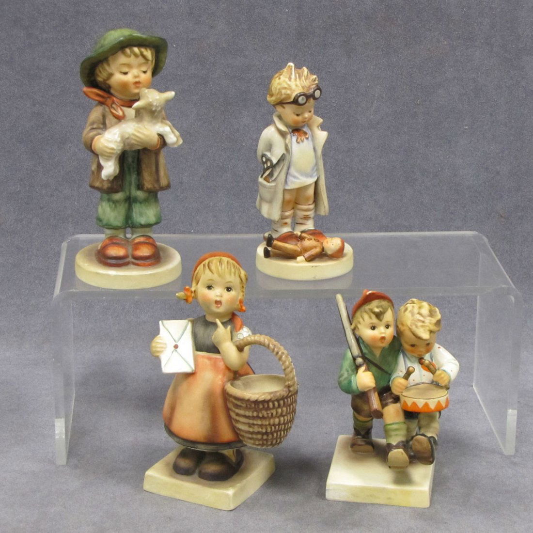 LOT (4) HUMMEL FIGURINES, TMK 3 INCLUDING #127 : LOT (4) HUMMEL FIGURINES, TMK 3 INCLUDING #127, #50 2/0, #13/0, #68/9 (2/MINOR KNICKS). HEIGHT 4 1/2-5 1/4"
